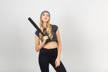 Cool hot fashionable  criminal woman bandit dressed in hat with