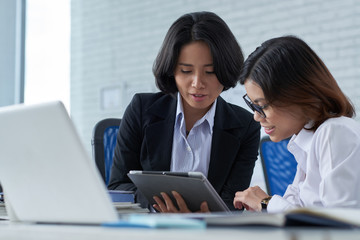 Colleagues with tablet