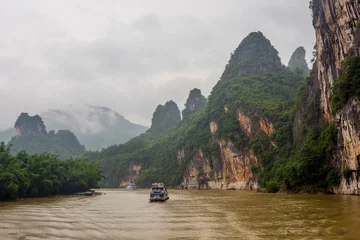 Fototapete Rund Boat cruise on Li river, Guangxi Zhuang, China © dinozzaver