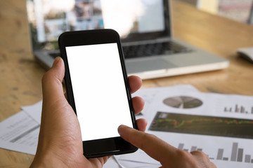 Woman with modern mobile phone in hands touching on a blank scre