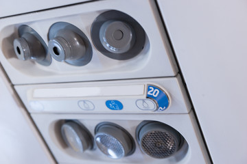 Overhead console in the passenger airplane