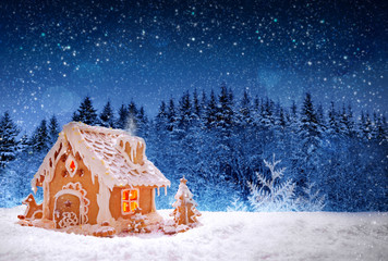 Christmas Gingerbread house and snowfall.