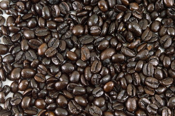 Bunch of Roasted coffee beans forming background