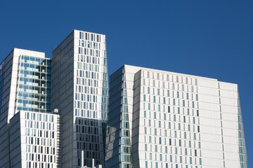 Obraz premium Modern skyscrapers on a background of blue sky