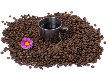 grains of black coffee, inside cup of coffee