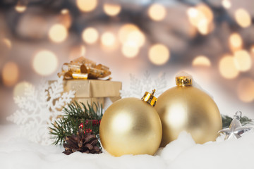 christmas decorations on golden bokeh background