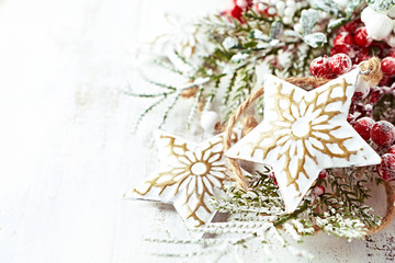 Vintage christmas decoration on white painted wooden background

