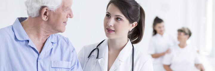 Doctor looking with concern at patient