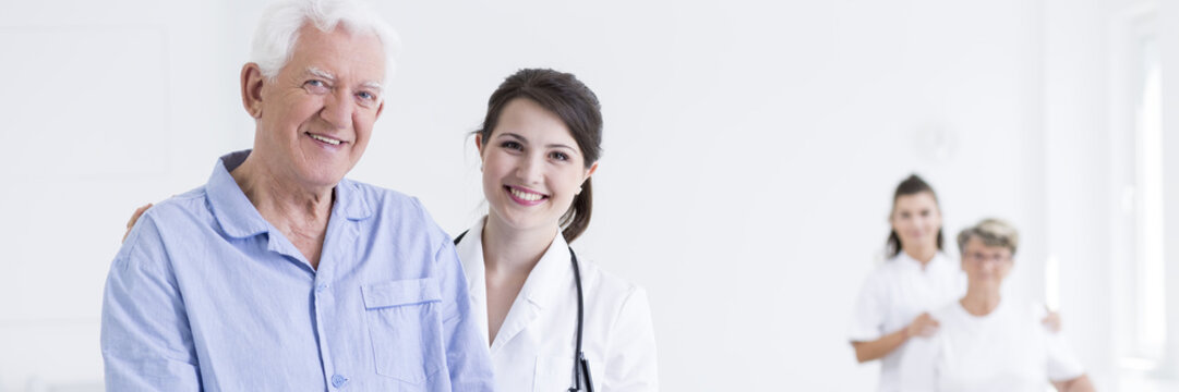 Young doctor and senior patient