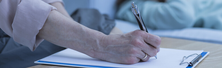 Therapist taking notes