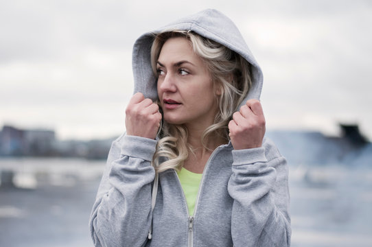 Portrait of woman in hoodie
