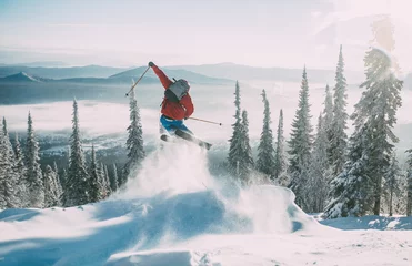 Fotobehang Wintersport Skiër springen