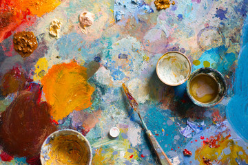 Background image of bright oil-paint palette