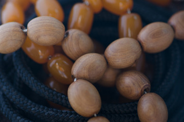 Beads made of wood and amber macro