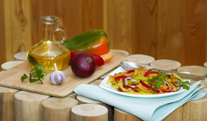 Spicy salad on wooden background