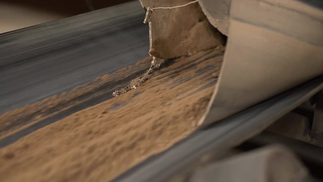 Brick production. View of sand moves on conveyor