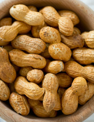 peanuts on wooden surface