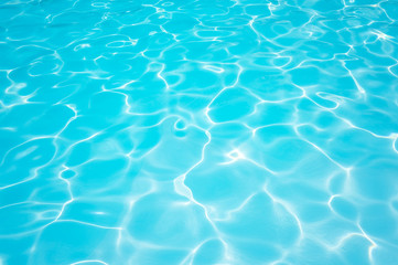 Naklejka na ściany i meble Beautiful Blue water surface in swimming pool