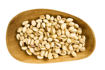 roasted and salted pistachio nut isolated on white