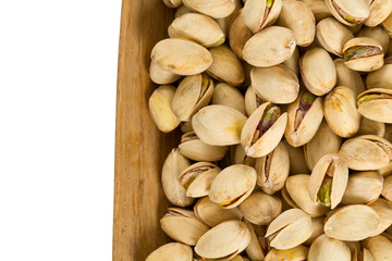 roasted and salted pistachio nut isolated on white