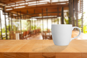 A cup of coffee on table in cafe.