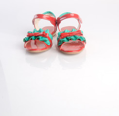 shoe or beautiful little girl shoes on a background.
