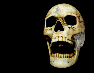 opening mouth human skull double exposure with moon surface isolated on black background with copy...