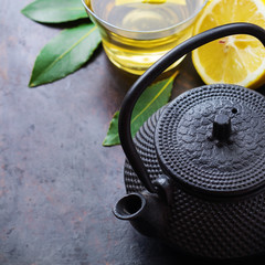 Obraz na płótnie Canvas Japanese chinese tea teapot lemon