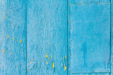 Vintage blue wood background with peeling paint
