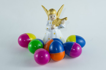 Merry Christmas and Happy New Year,Easter eggs and the Angels on white background