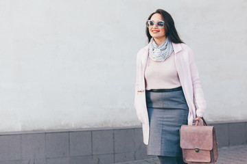 Plus size model in pink coat