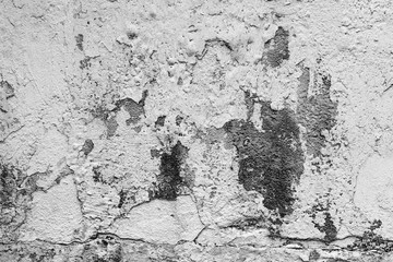 Wall fragment with scratches and cracks