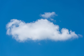 Beautiful single white cloud on blue sky