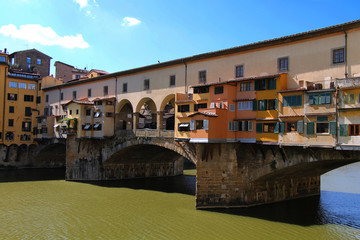 Fototapeta na wymiar Florence. Italy. Summer view of the city. Ponte Vecchio. Arno River.