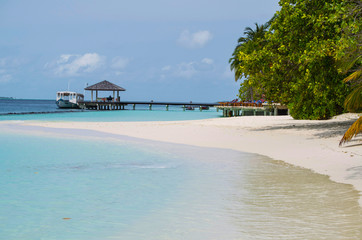 Sunny beach view on Maldives
