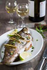 Baked trout with lime and white wine