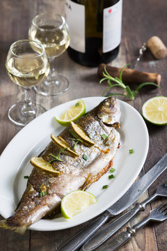 Baked trout with lime and white wine