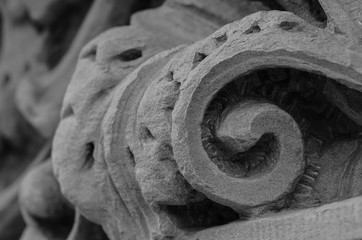 Stone work from a building close up in black and white