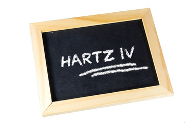 Eine Kreidetafel mit dem Wort Hartz 4
