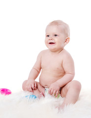 sitting baby playing