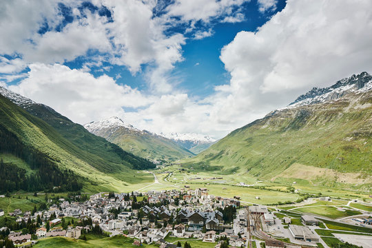 Elevated view of mountains and valley village, Andermatt, Switzerland
