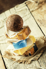 Natural soap on a vintage wooden background, selective focus