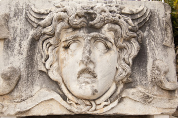 Ancient stone sculpture at the ruins of Miletus in Turkey