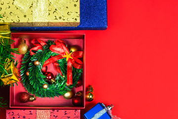 Merry colors gift boxes placed christmas on red background