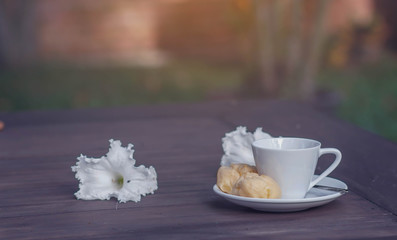 cup of coffee on the wooden table