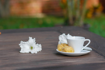 cup of coffee on the wooden table
