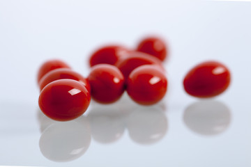 Set of capsules on white background