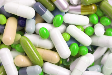 Set of capsules on white background