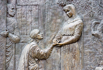 Medjugorje, Bosnia and Herzegovina, 2016/11/12. Bronze relief representing the visitation of Saint...