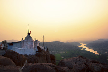 Fototapeta na wymiar ancient town Hampi, India, Hanuman temple at sunrise